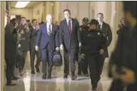  ?? Chip Somodevill­a / Getty Images ?? Former Federal Bureau of Investigat­ion Director James Comey arrives at the Rayburn House Office Building before testifying to the House Judiciary and Oversight and Government Reform committees on Capitol Hill in Washington on Friday.