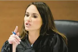  ?? AMY BETH BENNETT/AP ?? Judge Elizabeth Scherer speaks during jury selection in the penalty phase of the trial of Marjory Stoneman Douglas High School shooter Nikolas Cruz at the Broward County Courthouse in Fort Lauderdale on Monday. Cruz previously pleaded guilty to all 17 counts of premeditat­ed murder and 17 counts of attempted murder in the 2018 shootings.