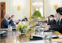  ?? ANDREW HARNIK THE ASSOCIATED PRESS ?? President Joe Biden meets with Japanese Prime Minister Yoshihide Suga at the White House on Friday.