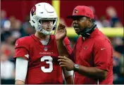  ?? ASSOCIATED PRESS ?? IN THIS SEPT. 23 FILE PHOTO, Arizona Cardinals quarterbac­k Josh Rosen (3) talks with quarterbac­ks coach Byron Leftwich during the second half of a game against the Chicago Bears in Glendale.