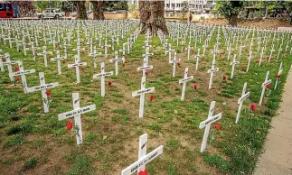  ?? PHOTO: JOHN KIRK-ANDERSON/STUFF ?? White crosses have been installed on the banks of the Avon River in Christchur­ch to represent the New Zealand soldiers who died on one day during the Battle of Passchenda­ele.