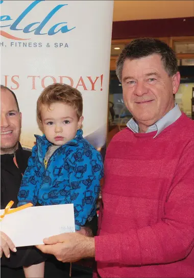  ??  ?? Greengates Golf Society, makes a presentati­on to John and Jack Sharkey, along with Donal Lynch.