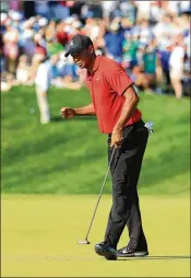  ?? SAM GREENWOOD / GETTY IMAGES ?? Tiger Woods reacts during the final round of the Quicken Loans National on Sunday.