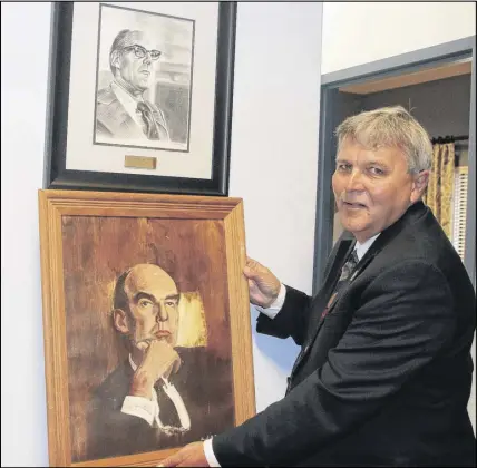  ?? LYNN CURWIN/TRURO DAILY NEWS ?? Truro Mayor Bill Mills hopes to have the recently donated oil painting of Robert Stanfield placed in the town administra­tion office, near Anna Fullerton’s charcoal sketch of the former politician.