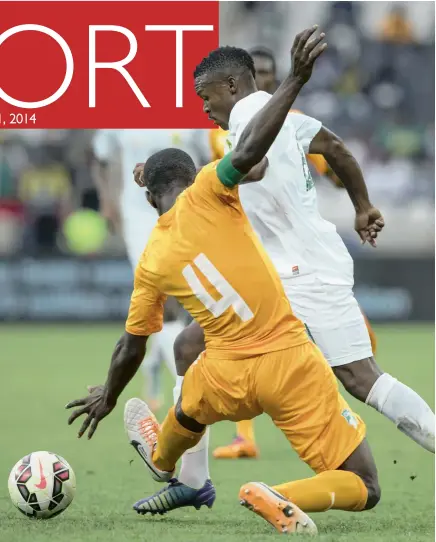  ?? PICTURE: GALLO IMAGES ?? ON THE RUN: Vuyisile Wana of Bafana Bafana tries to avoid the tackle of Kessie Franck Yannick of Ivory Coast during the Nelson Mandela Challenge at Mbombela Stadium yesterday. The young and inexperien­ced South African side beat their much more...