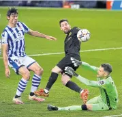  ?? REUTERS ?? Barcelona’s Lionel Messi, centre, scores against Sociedad during a La Liga match last month.