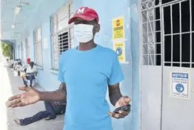  ?? (Photos: Karl Mclarty) ?? Joseph Wright, who has been homeless for more than 20 years, makes a point outside the shelter on Church Street in downtown Kingston on Tuesday.