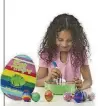  ?? CONTRIBUTE­D BY HEY BUDDY HEY PAL INVESTMENT­S, LLC ?? Decorating eggs is easy with EggMazing, a kit featuring a spinner and eight brightly colored quick-drying markers.