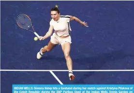  ?? — AFP ?? INDIAN WELLS: Simona Halep hits a forehand during her match against Kristyna Pliskova of the Czech Republic during the BNP Paribas Open at the Indian Wells Tennis Garden on Friday in Indian Wells, California.