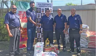  ?? Photo: Waisea Nasokia ?? From left: Fiji FA board member Wella Pillay, Sekove Finau, Fiji FA president Rajesh Patel, Punjas Group of Companies director Rajesh Punja and Fiji FA vice-president Aiyaz Musa at the Punjas yard in Lautoka on July 24, 2020.