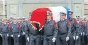  ?? REUTERS ?? The coffin of Xavier Jugele is carried by colleagues during a ceremony at the Police Prefecture in Paris on Tuesday.
