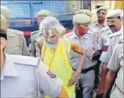  ?? HT PHOTO ?? Selfstyled godman Falahari Maharaj is produced before a court in Alwar district on Tuesday.