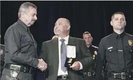 Officers recognized for bravery restraint PressReader