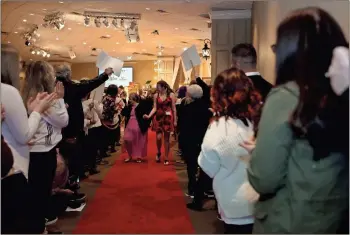  ?? Contribute­d by Gail Conner ?? Participan­ts at Polk County’s Night to Shine Prom got the red carpet treatment as the event got underway at Second Baptist Church in Cedartown.