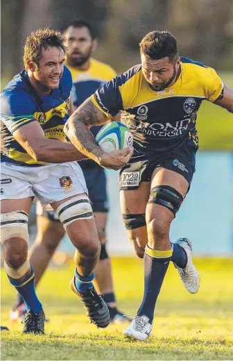  ?? Picture: JERAD WILLIAMS ?? Bond's Tainui Ford powers through a gap against Easts and (below from left) Harry Nucifora evades a tackle and Mitch Third fires out a pass.