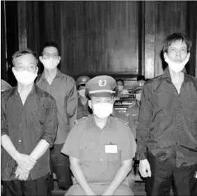  ??  ?? Pham Chi Dung, Nguyen Tuong Thuy and Le Huu Minh Tuan. (Photo:RFI)