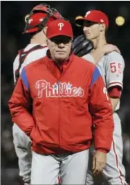  ?? JEFF CHIU — THE ASSOCIATED PRESS ?? Despite the promising young players scattered throughout his lineup, Phillies manager Pete Mackanin still has plenty of uncertaint­y headed into next season. That includes whether or not he’ll be coming back.