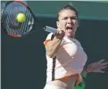  ?? LYNNE SLADKY/THE ASSOCIATED PRESS ?? Simona Halep posted a 3-6, 6-3, 7-5 second-round win over Oceane Dodin on Thursday at the Miami Open.