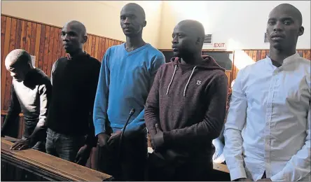  ?? Picture: LULAMILE FENI ?? FACING TRIAL: Five Walter Sisulu University students who are facing murder charges after the death of final-year WSU medical student, Lwando Mantshonts­ho, early last month, in the dock at Mthatha High Court for a formal bail hearing