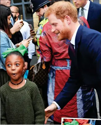  ??  ?? Surprise! Harry meets young girl yesterday