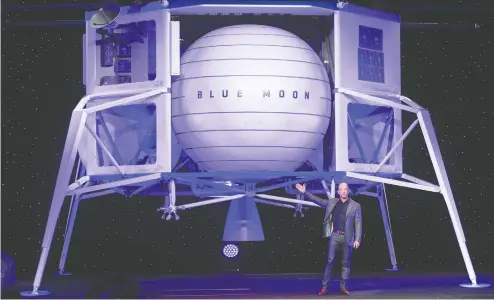  ?? SAUL LOEB / AFP VIA GETTY IMAGES FILES ?? Jeff Bezos in 2019 announcing Blue Moon, a lunar landing vehicle for the Moon, at a Blue Origin event in Washington, D.C.