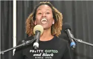  ?? (Pine Bluff Commercial/I.C. Murrell) ?? Erikka Johnson sings “Lift Every Voice,” which is otherwise referred to as the Black national anthem.