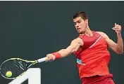  ?? GETTY IMAGES ?? Spanish tennis prodigy Carlos Alcaraz made short work of his qualifier opponent at the Australian Open yesterday.