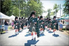  ?? PHOTO PROVIDED ?? The Schenectad­y Pipe Band will be one of the many participan­ts in this year’s Flag Day parade in Saratoga Springs.