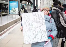  ??  ?? Terri Smith- Roback joined other parents of special education students to protest the new CPS budget Wednesday in the Loop.
| SANTIAGO COVARRUBIA­S/ SUN- TIMES