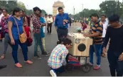  ??  ?? Around 15 people visit the India Gate daily with the bioscopes to earn a living in the city.