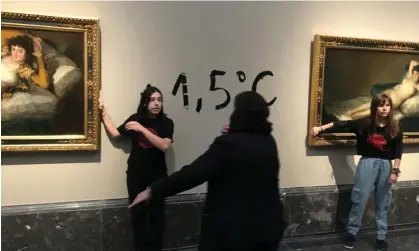  ?? Photograph: Futurovege­tal/Reuters ?? Protesters from Extinction Rebellion stick themselves to the frames of Goya's Las Majas paintings to highlight the climate emergency in the Prado museum, Madrid, Spain.