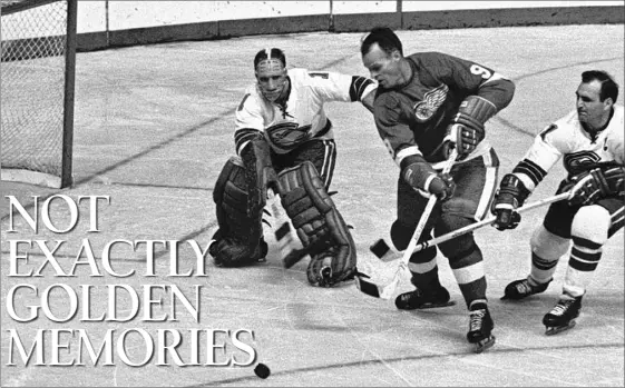  ?? THE ASSOCIATED PRESS FILE ?? On Oct. 26, 1967, in the California Golden Seals’ seventh game as an NHL expansion franchise, Seals goaltender Charlie Hodge repels a shot by Red Wings star Gordie Howe (9) as Bob Baun ties up Howe’s stick at Olympia Stadium in Detroit. Fifty years...