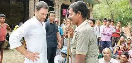  ?? PTI ?? Congress President Rahul Gandhi interacts with the villagers, in Amethi on Wednesday