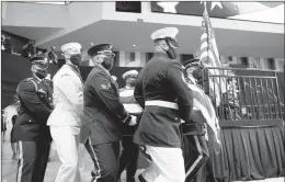  ?? MICHAEL M. SANTIAGO/GETTY ?? Pallbearer­s carry the casket holding former U.S. Rep. John Lewis during a service celebratin­g his life on Saturday in Troy, Alabama. Ceremonies are planned for the next six days.