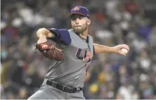  ?? Denis Poroy / Getty Images ?? Royals No. 1 starter Danny Duffy went 2-0 for the United States during the World Baseball Classic.