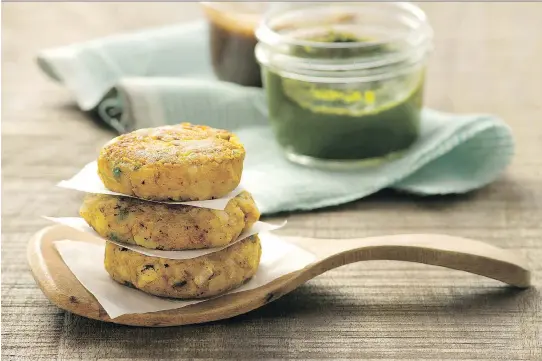  ??  ?? Aloo Tikki (spicy potato patties) from Indian for Everyone by Anupy Singla, who says the focus in Indian cuisine is less on technique and more on understand­ing the spices.