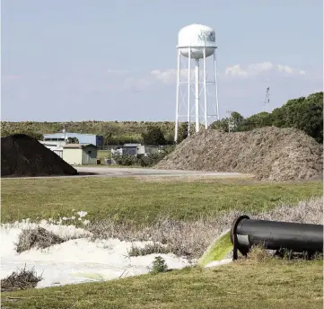  ?? DOUGLAS R. CLIFFORD
Tampa Bay Times via AP ?? Piney Point effluent flows into a drainage ditch on April 6.