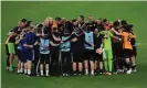  ?? Photograph: Sam Bagnall - AMA/Getty Images ?? Wolves players and staff huddle after progress to Germany was secured.