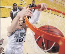  ?? ELSA GETTY IMAGES ?? Donte DiVincenzo of the Villanova Wildcats dunks against Texas Tech on Sunday in Boston. Villanova won the contest, 71-59.