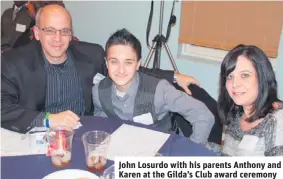  ??  ?? John Losurdo with his parents Anthony and Karen at the Gilda’s Club award ceremony