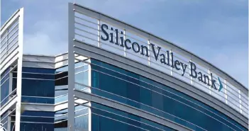  ?? — AFP photo ?? SVB’s collapse swiftly caused the collapse of a number of regional banks and the merger under pressure of Swiss banking giant Credit Suisse with regional rival UBS.