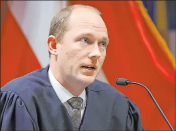  ?? Alex Slitz The Associated Press file ?? Fulton County Superior Judge Scott Mcafee will allow the defense in the Georgia election interferen­ce case to appeal his ruling that Fani Willis can remain prosecutor.