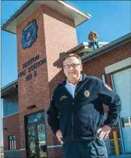  ?? WILLIAM HARVEY/TRILAKES EDITION ?? Benton Fire Chief Bill Ford stands in front of the new combined fire and police substation at 1400 Arkansas 5 N. in Benton. Ford said the station is 10,000 square feet collective­ly and cost approximat­ely $2.2 million. The need for the station is a...