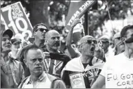  ?? GETTY IMAGES ?? A Brexit supporter shouting to pro-EU campaigner­s during their march to Parliament. The UK Unity and Freedom March was a celebratio­n of the vote to leave the EU.