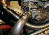  ??  ?? Meanwhile, there has been a style debate in The Shed. Two of the three participan­ts reckon that the top bracket linking the two exhaust headers is ugly and unnecessar­y