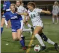  ?? FRANK GAMBATESE - FOR THE NEWS-HERALD ?? Lake Catholic’s Andrea Babic ties to work the ball upfield against Bay in a state semifinal on Nov. 6.