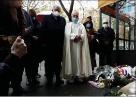  ?? REUTERS ?? Rector of the Great Mosque of Paris, Chems-eddine Hafiz and French Muslim clerics pay tribute outside the Bataclan concert venue during a ceremony marking the fifth anniversar­y of the deadly terror attacks in Paris, France, on 13 November 2020.