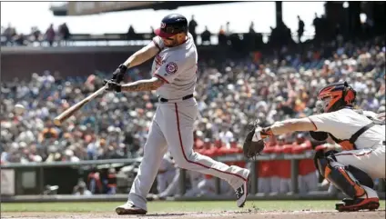  ?? PHOTO/MARCIO JOSE SANCHEZ ?? Washington Nationals’ Matt Adams hits a single during the first inning against the San Francisco Giants on Wednesday, in San Francisco. AP