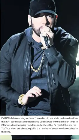  ??  ?? EMINEM did something we haven’t seen him do in a while – released a video that isn’t self-serious and depressing. Godzilla was viewed 15million times in 24 hours, drawing praise from fans and critics alike. Be careful though, the YouTube views are almost equal to the number of swear words contained in the song.