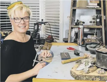  ??  ?? Jewellery maker Dani Crompton at work in her studio (photo: Tany Fahy)